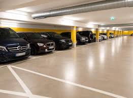 Airport traveler long term guarded car parking with free terminal shuttle